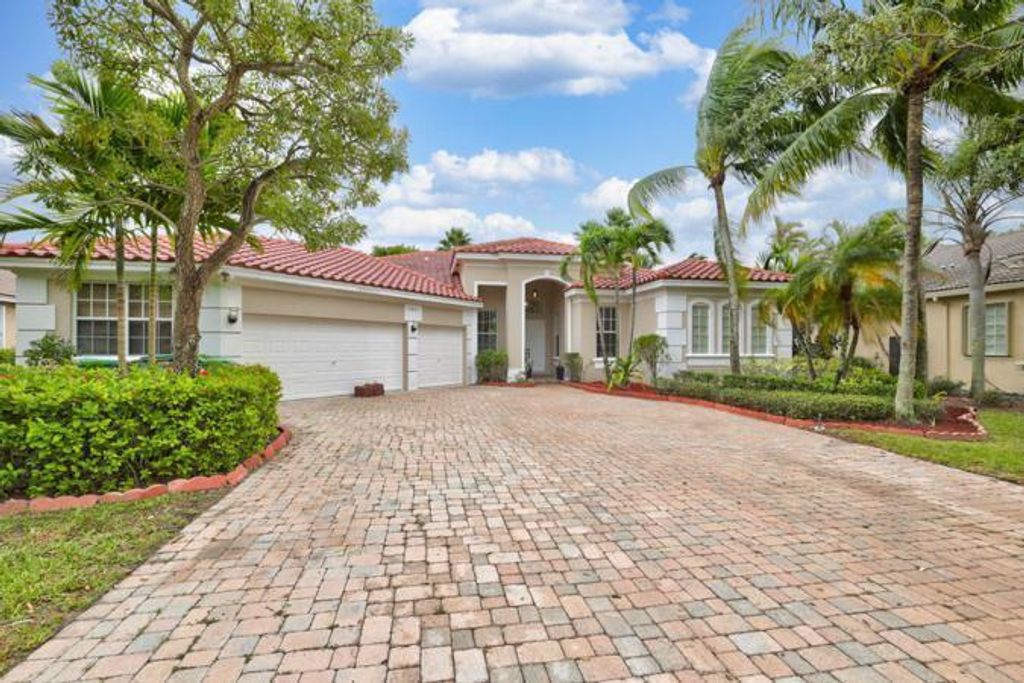 Photo of 5041 NW 112 Drive, Coral Springs, FL 33076 (MLS # R10760210)