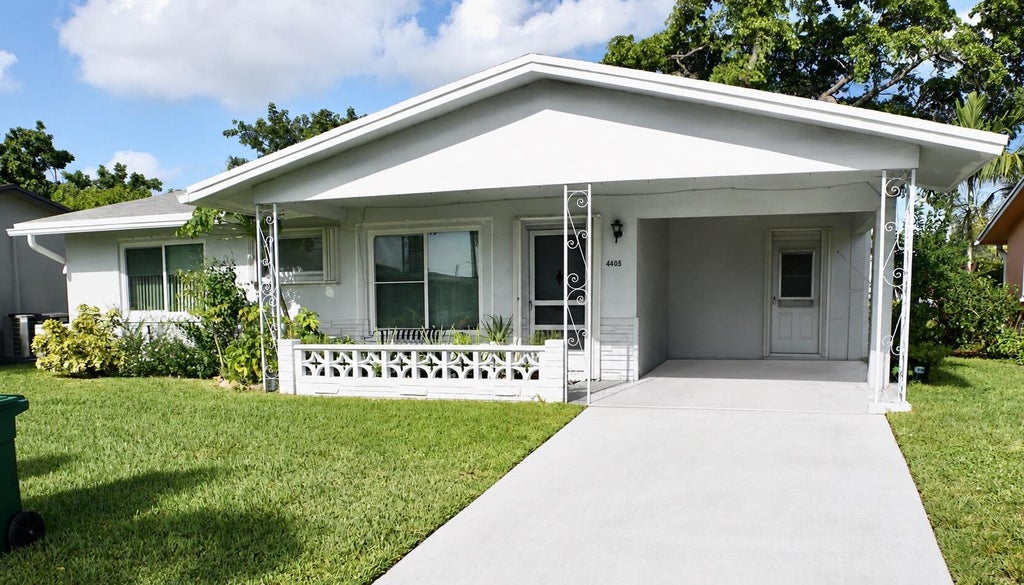 Photo of 4405 NW 48th Avenue, Tamarac, FL 33319 (MLS # B26068474)