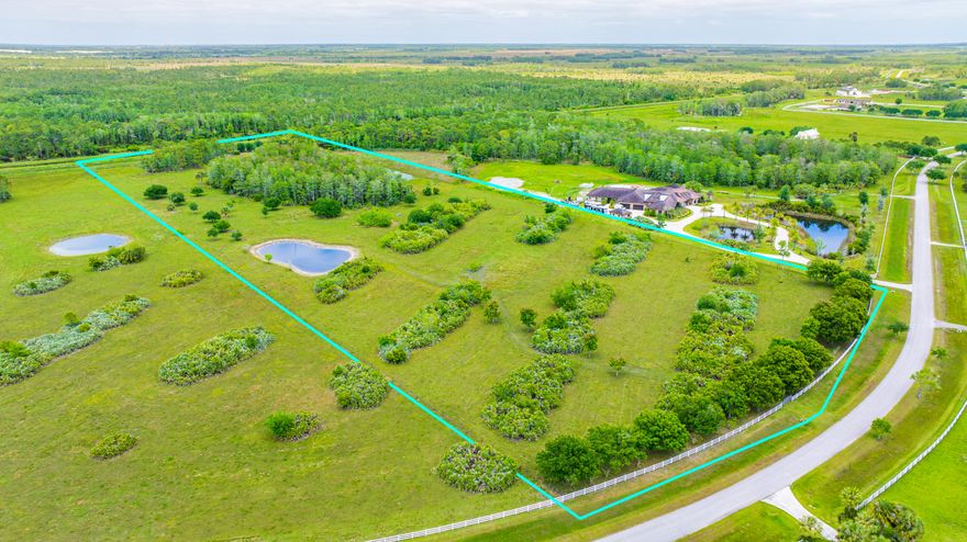 Where Luxury Meets Land yet Minutes from the Coast.  Only 41 Homesites! A truly rare opportunity to own 20 acres in the exclusive, gated equestrian community of Trailside—one of Martin County's most private and expansive estate enclaves. Set among winding paved roads, towering native trees, and miles of dedicated bridle trails, this extraordinary parcel offers the ideal canvas to create a custom estate, private ranch, or luxury retreat. Evoking the charm of Old Florida's large land tracts, the property delivers space, serenity, and natural beauty—while remaining just minutes from the coast. With generous acreage, the property provides exceptional flexibility for a main residence, guest house, barns, paddocks, and more—all while maintaining the utmost privacy.    Trailside is a boutique community of just 41 estate homesites, each spanning 20-35 acres, designed for those who value space, scale, and a refined country lifestyle.  Enjoy the tranquility of wide-open land and natural surroundings, while remaining just a short drive to the beaches, boating, golf, and dining of Stuart, Jupiter, and Hobe Sound.  A rare chance to build your vision in one of South Florida's most unique and tightly held acreage communities.