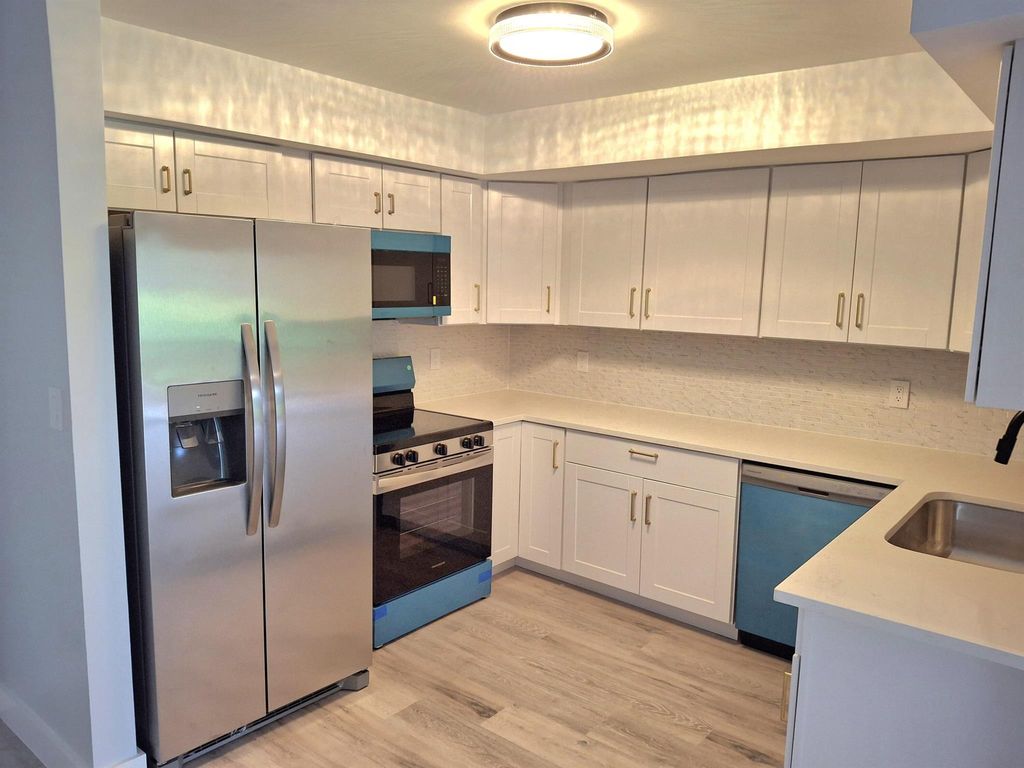 Photo of 6515 Chasewood Drive #D, Jupiter, FL 33458 (MLS # R11091179)