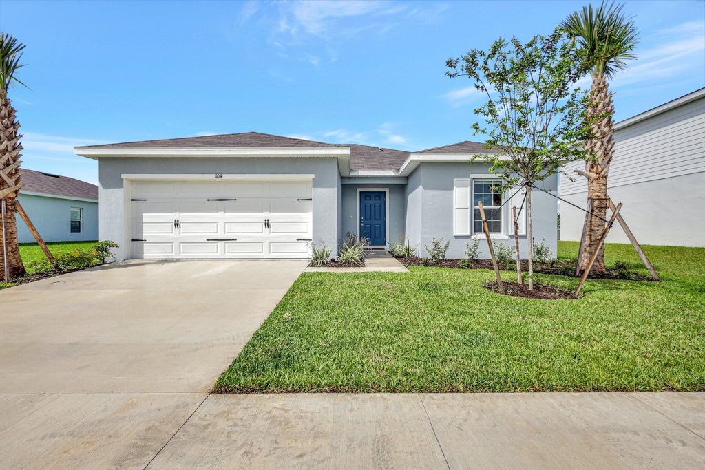 Photo of 104 Pummelo Place, Fort Pierce, FL 34981 (MLS # R11080360)