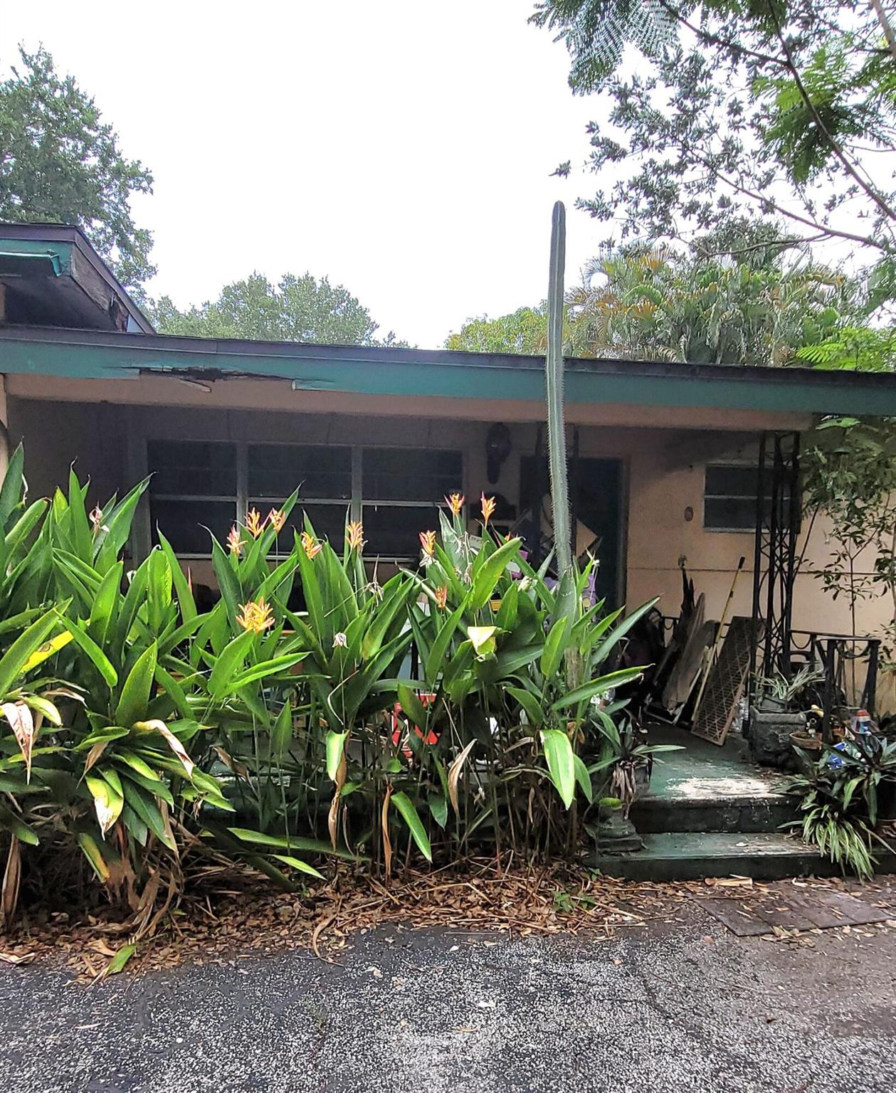 Amazing opportunity in a highly desirable Plantation Garden neighborhood. Spacious 3 bed / 2 bath / 2 car garage single family home sitting on a generous .35-acre lot with a pool and mature fruit trees and room to grow. This property features an eat-in kitchen with solid oak cabinets leading to both a covered patio and open pool deck. Circular driveway for easy access and extra parking. Has a nice layout with great bones, ready for your vision and remodel with solid footprint in a desirable neighborhood - ideal for a flip or long-term hold. Priced for repairs.