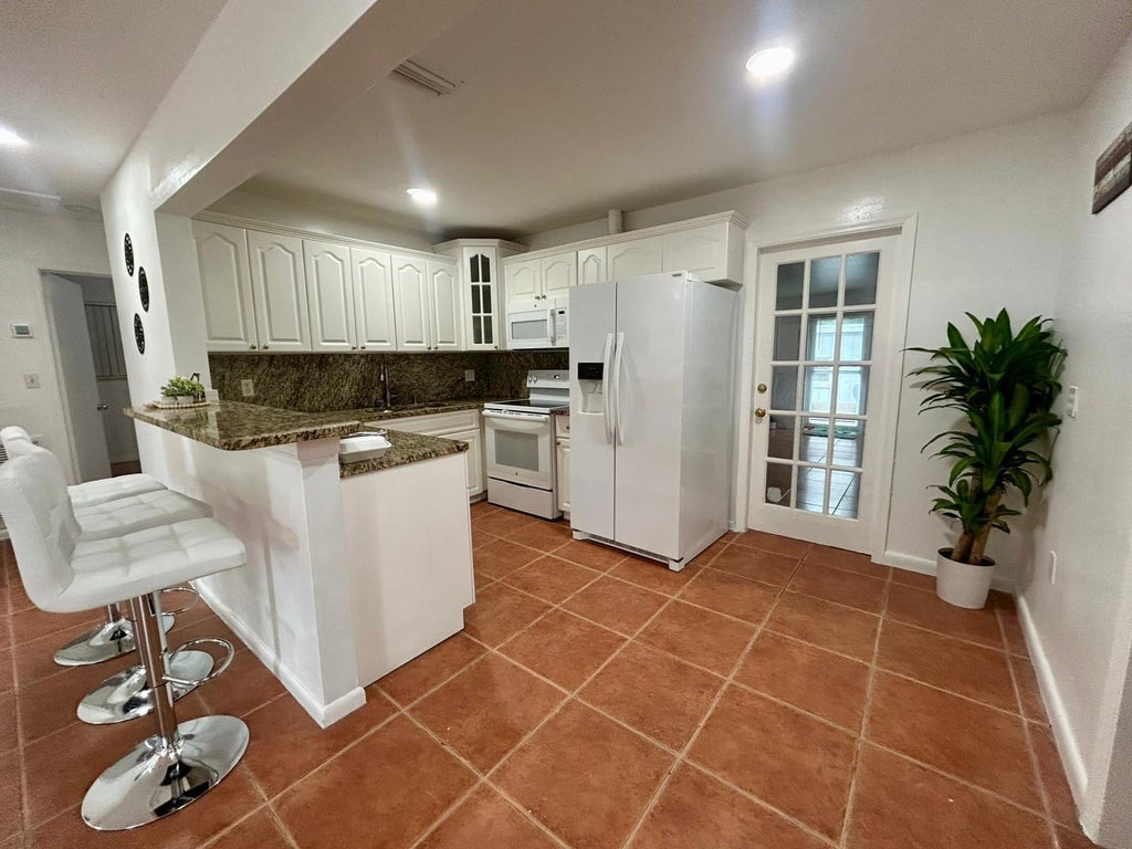 Photo of 4292 Colt Lane, West Palm Beach, FL 33406 (MLS # R11004229)