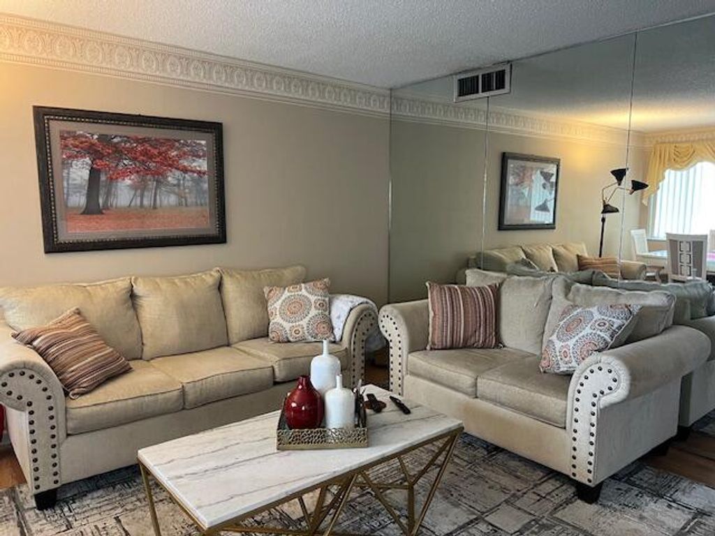Photo of 3400 Springdale 303 Boulevard #303, Palm Springs, FL 33461 (MLS # R11089724)