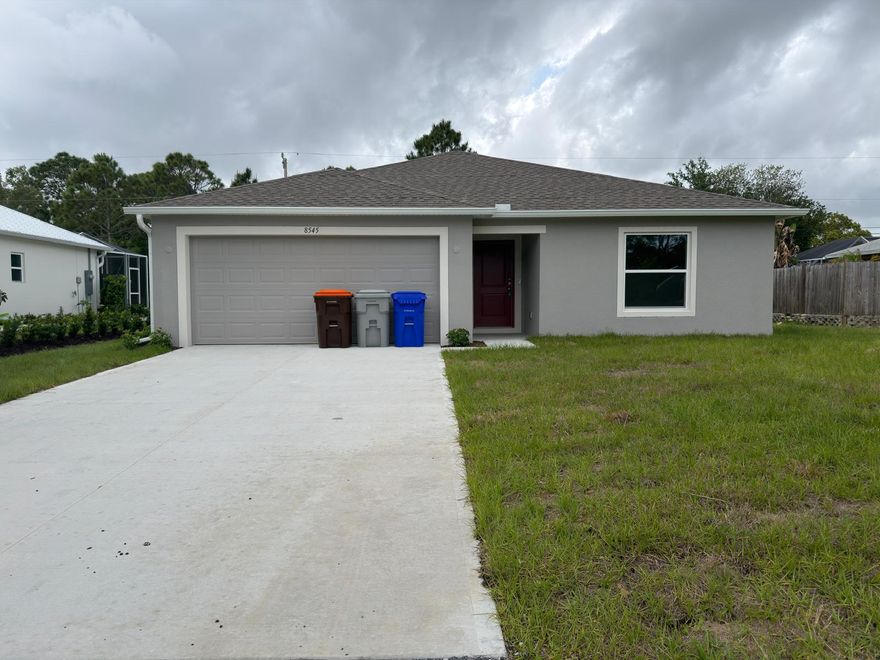 Discover your dream home in the heart of Vero Beach, FL! This stunning 1,443 square foot residence, built in 2026, 3/2/2 Double Garage. The open concept layout seamlessly connects the living, dining, and kitchen areas, making it perfect for entertaining or simply enjoying your own space. Experience the ease of laundry day with a full-size washer and dryer conveniently located within the home, complemented by a new water filtration system for clean, refreshing water. The air conditioning system ensures a cool retreat from the Florida sun, while the double garage provides ample space for vehicles and storage. Enjoy the outdoors with Wabasso Beach just 20 minutes away. This property welcomes pets, making it an ideal choice for those who wish to share their new home with furry companions.