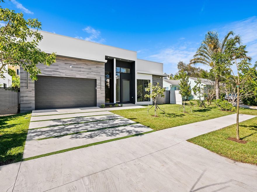 Introducing 531 NE 8th Ave, a brand-new construction pool home in the most desirable section of Victoria Park in the core of East Fort Lauderdale. The highly desired one-story modern home offers 4 generous bedrooms, 3 baths, 2 car garage & open floor plan with soaring ceilings. The oversized porcelain floor tiles, elegant finishes, tall glass, & contemporary fixtures complete the modern & fresh theme of the design. The primary bedroom is a true sanctuary, featuring a tailored walk-in closet, a freestanding tub for relaxation & access to your private fenced yard with a pool and covered BBQ. 3 additional rooms offer plenty of guest space for a home office & a Peleton or yoga area. NE 8th is a quiet residential street near the Beach, Las Olas Blvd, shopping & retail, & the local social spots.