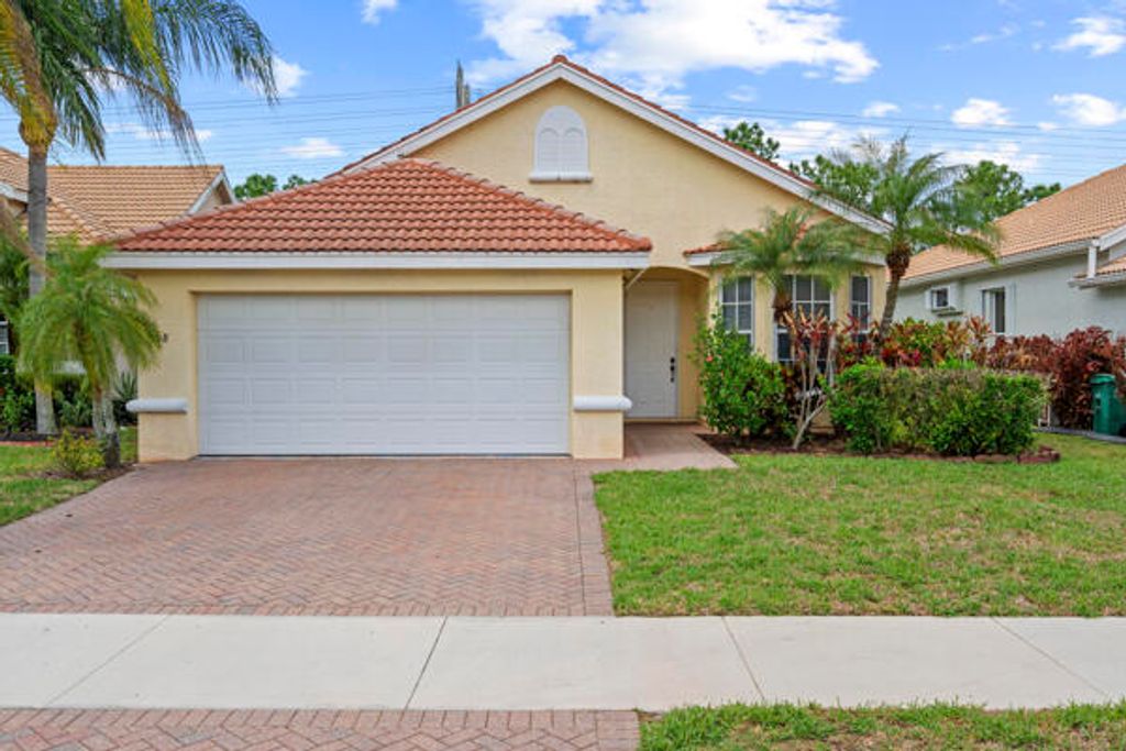 Photo of 808 SW Munjack Circle, Port Saint Lucie, FL 34986 (MLS # B26012943)