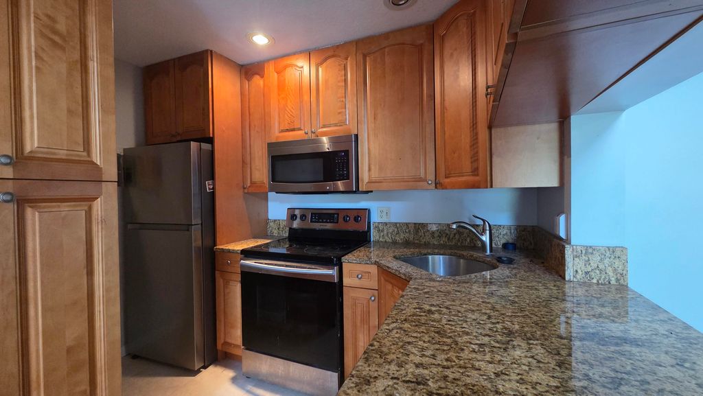 Photo of 1015 Green Pine Boulevard #E3, West Palm Beach, FL 33409 (MLS # B26019917)