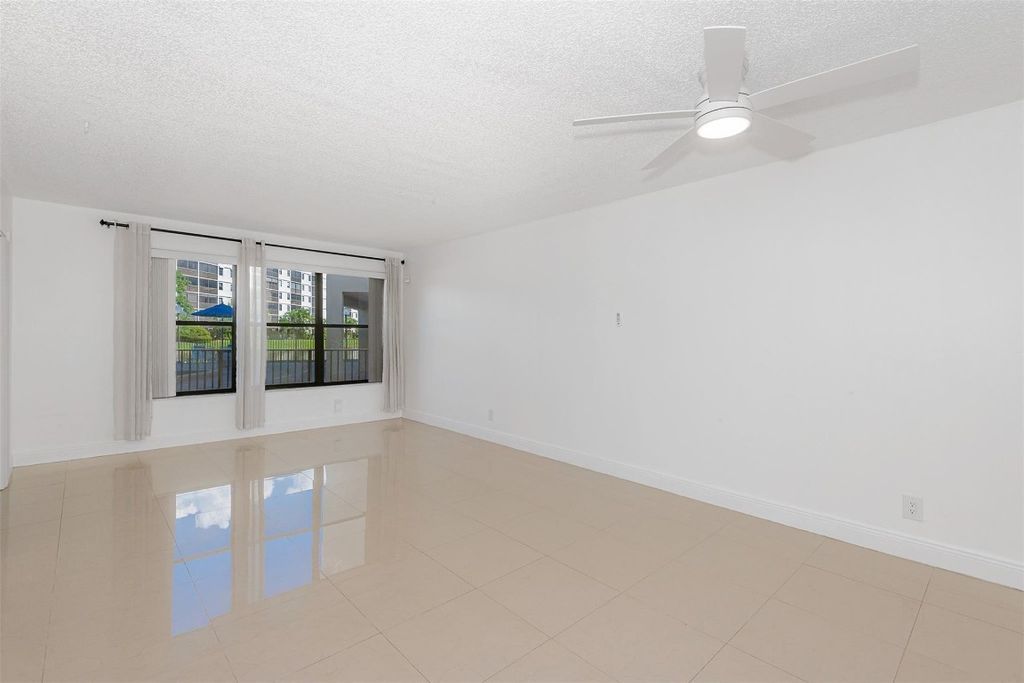 Photo of 2307 S Cypress Bend Drive #108A, Pompano Beach, FL 33069 (MLS # F10528078)