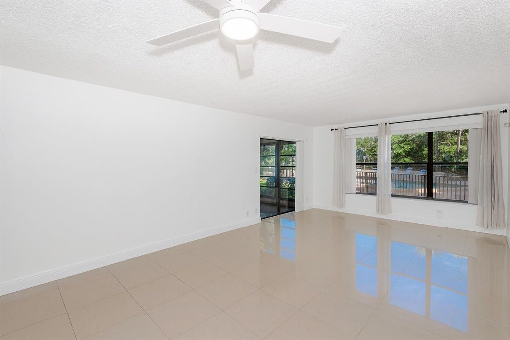 Photo of 2307 S Cypress Bend Drive #108A, Pompano Beach, FL 33069 (MLS # F10528078)