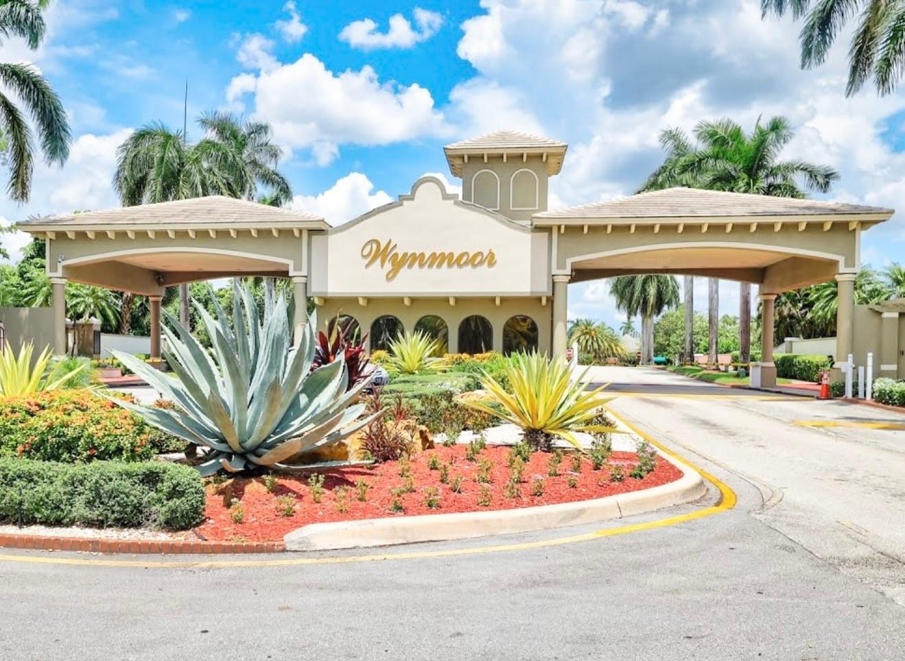 WELCOME TO WYNMOOR, THIS SPACIOUS CORNER CONDO BOASTS 1291 SQUARE FEET OF LIVING SPACE, SCREENED PATIO WITH ROLLUPS OVERLOOKING A BEAUTIFUL LAKE, FOUNTAIN, AND BRIDGE, NICELY FURNISHED, INCLUDING 3 FLAT SCREEN TVs. THE GUEST BEDROOM HAS A SLEEPER SOFA. BATHROOMS FEATURE GRANITE COUNTERTOPS. FRONT DOOR HAS IMPACT RESISTANCE WITH FROSTED GLASS. THIS 24/7 PATROLLED GATED COMMUNITY OFFERS A HEATED SWIMMING POOL WITH BBQ, AN 18-HOLE GOLF COURSE, RESTAURANT, TENNIS AND PICKLEBALL COURTS, A THEATRE, MOVIES, AND SHOWS. FITNESS CENTER
WITH ZUMBA, WATER AEROBICS, BILLIARDS CENTER, RESISTANCE WALKING POOL, SAUNA, SHUTTLE BUS SERVICE, AND OVER 100 CLUBS. PARKING SPACE #125. MOVE IN READY!