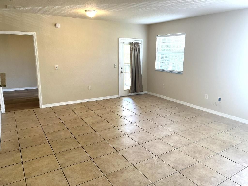 Photo of 158 SW Peacock Boulevard #30-203, Port Saint Lucie, FL 34986 (MLS # R10952840)