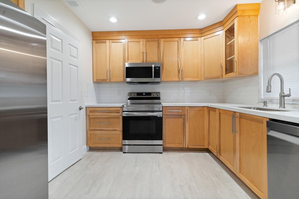 Photo of 1601 SE Mistletoe Street, Port Saint Lucie, FL 34983 (MLS # R10979674)