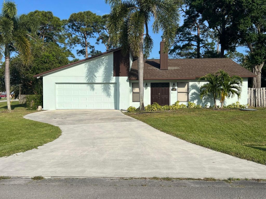 Photo of 1601 SE Mistletoe Street, Port Saint Lucie, FL 34983 (MLS # R10979674)