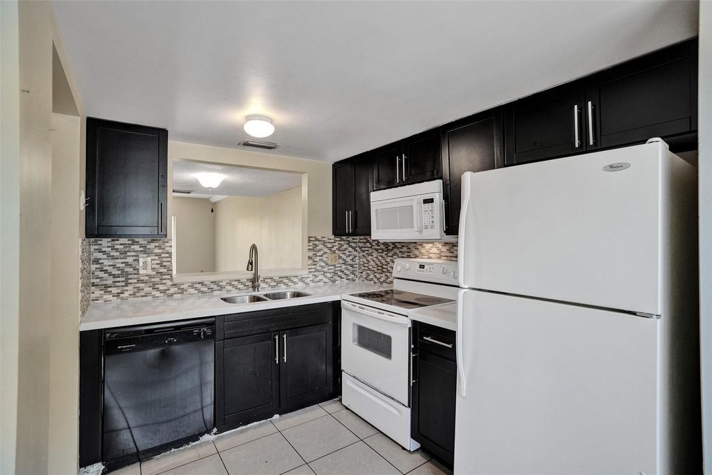 Photo of 3861 NW 90th Ave #3861, Fort Lauderdale, FL 33351 (MLS # F10536032)