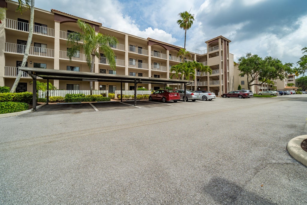 Photo of 6193 Pointe Regal Circle #108, Delray Beach, FL 33484 (MLS # R10788853)