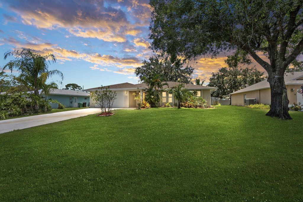 Photo of 1681 SE Clearmont Street, Port Saint Lucie, FL 34983 (MLS # R11111346)