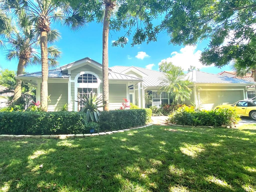 Photo of 6102 Winding Lake Drive, Jupiter, FL 33458 (MLS # R10881246)