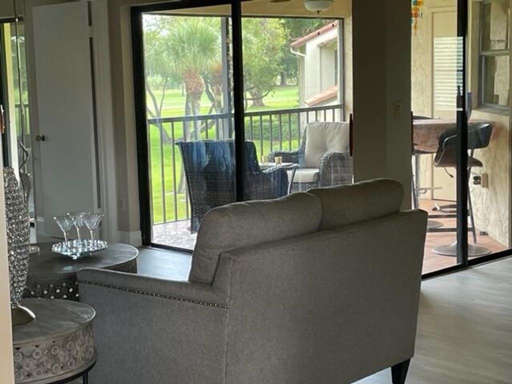 Photo of 5899 Parkwalk Drive, Boynton Beach, FL 33472 (MLS # B26010792)