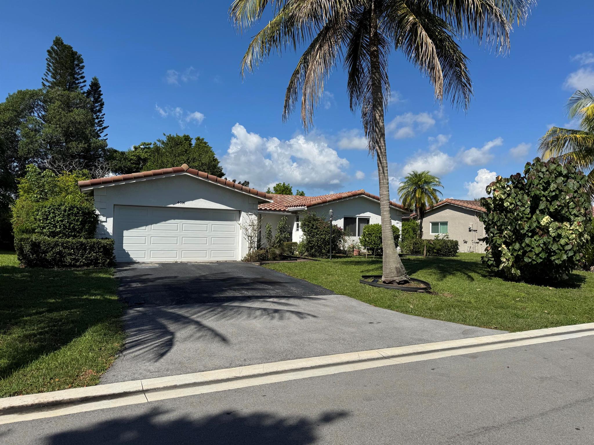Great Home in THE DELLS OF CORAL SPRING!  This 3 Bedroom 2 Bath WATER VIEW HOME, 2 car garage has a 2014: Roof, Electric panel, Hurricane impact windows. Hurricane garage door,  A/C and Kitchen. Enclosed Patio & Screened patio.  7 fruit trees (Mango, Ackee, Banana, Sweet Sap, Sour Sap, June Plumb, and Custard Apple.  PRICED TO SELL with all these upgrades. Centrally located and close to highways and places of worship. Ready to make your own.
