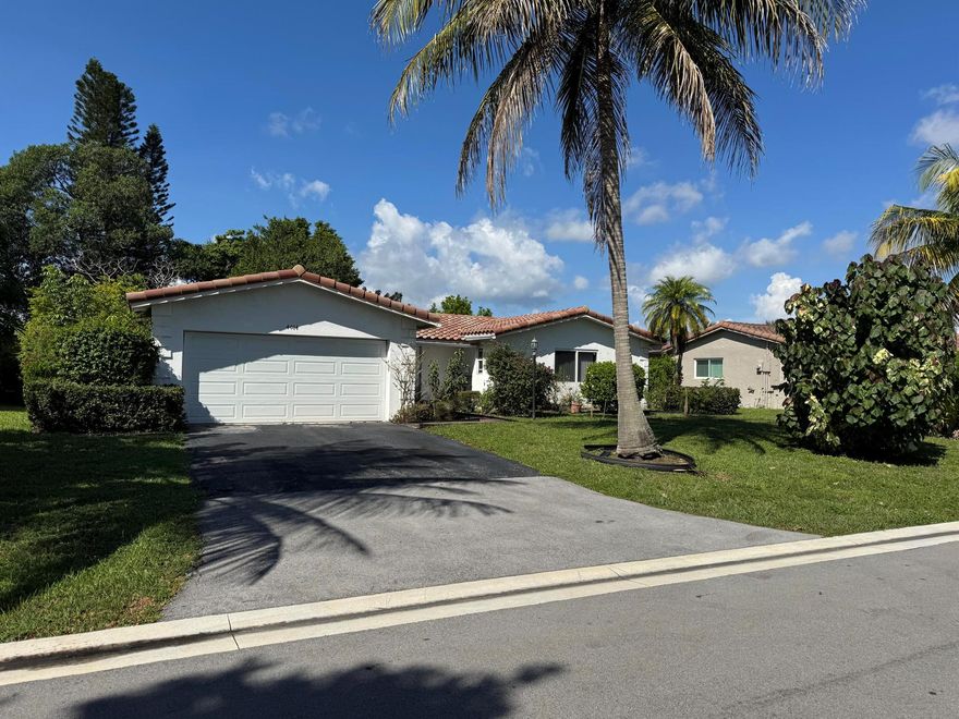 Great Home in THE DELLS OF CORAL SPRING!  This 3 Bedroom 2 Bath WATER VIEW HOME, 2 car garage has a 2014: Roof, Electric panel, Hurricane impact windows. Hurricane garage door,  A/C and Kitchen. Enclosed Patio & Screened patio.  7 fruit trees (Mango, Ackee, Banana, Sweet Sap, Sour Sap, June Plumb, and Custard Apple.  PRICED TO SELL with all these upgrades. Centrally located and close to highways and places of worship. Ready to make your own.