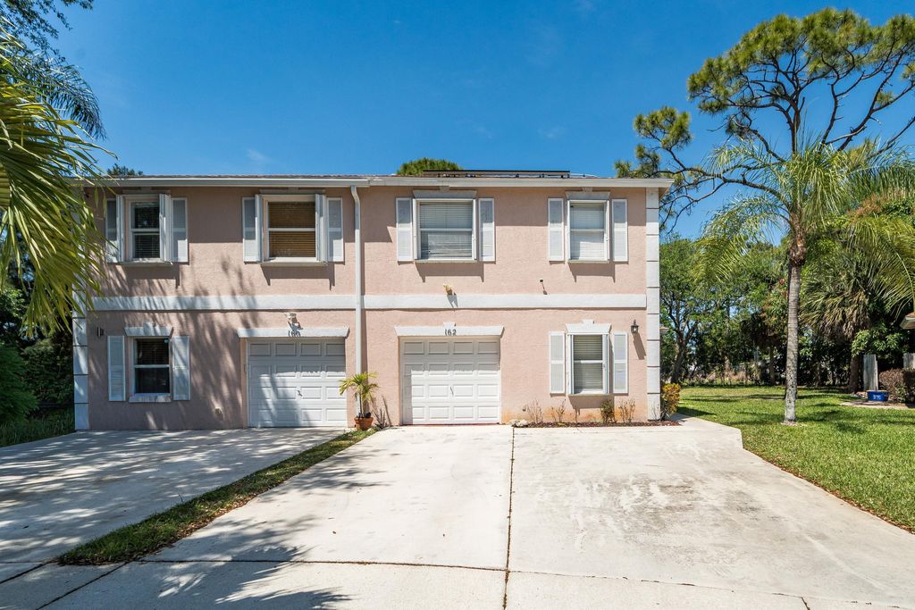 Photo of 162 Baldwin Boulevard, Greenacres, FL 33463 (MLS # B26012894)