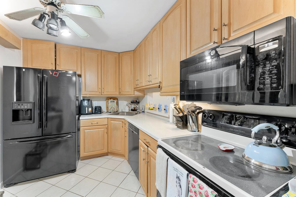 Photo of 5280 Las Verdes Circle #124, Delray Beach, FL 33484 (MLS # B26063997)
