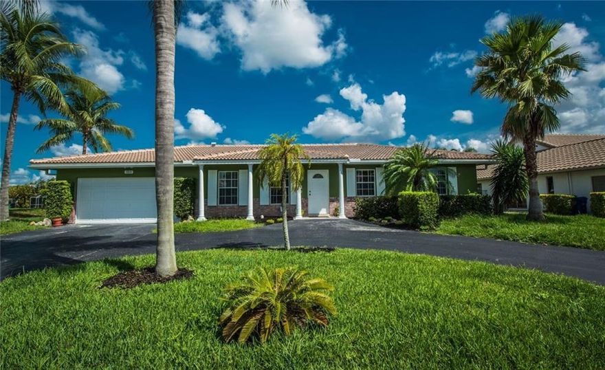 Ramblewood Section of Coral Springs, This 4/2 pool home w/canal view, features New Roof, Updated Electric, Beautiful eat in kitchen w/quartz tops, SS appliances, updated baths. Large living room plus family room/or can be used as formal dining room, Office off the kitchen, Screened pool with covered Patio perfect for entertaining. 2 car garage with laundry. Next to city park. Feel comfortable in this beautiful area with easy access to every where! Great Schools, Close to malls and shopping!