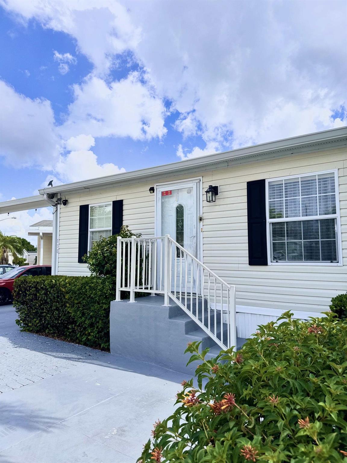 Get a big, spacious, UPDATED home along with an efficiency to offset costs and make rental income!! The main house has 3 bedrooms and 2 bathrooms while having an attached EFFICIENCY that has its own bathroom, kitchen, and PRIVATE ENTRANCE. This home is right on the WATER with a gorgeous back deck for unbeatable views all day and all year round. There is 4 parking spaces for both units INCLUDING additional room for another vehicle to park. This is a MUST SEE property! Make a wise and secure investment in buying this home by beating HOA fees and having steady rental income.