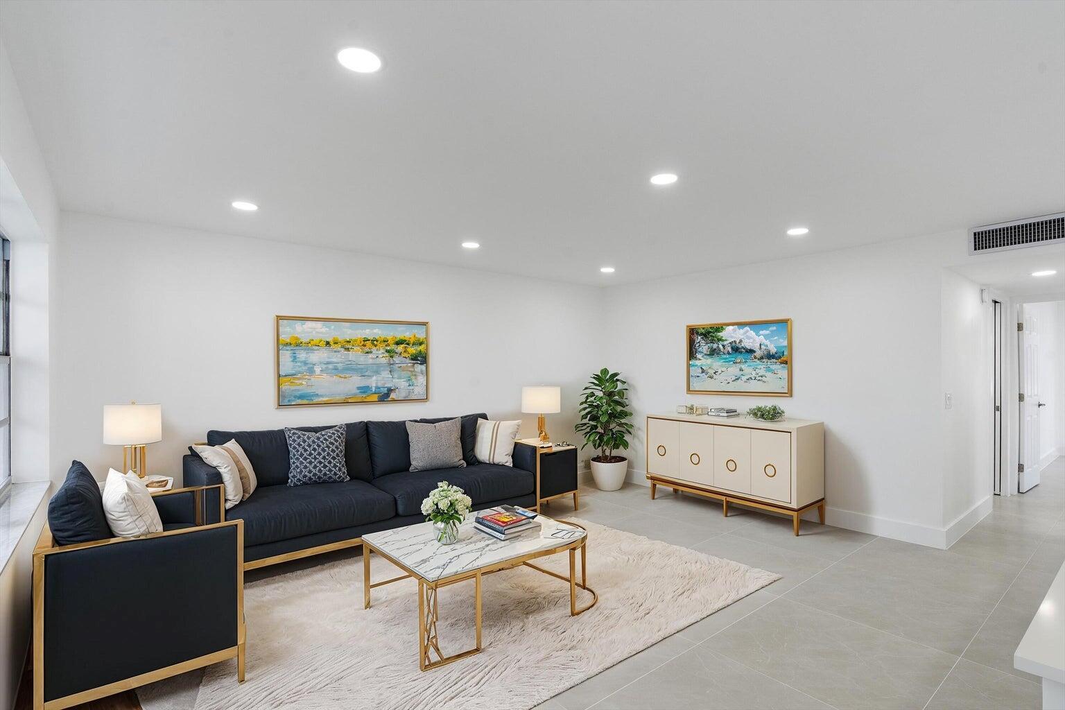 Larger first floor unit completely remodeled and ready for immediate occupancy! Extended oversized master bath, brand new stainless appliances, brand new full size washer and dryer in unit, porcelain tile floors, all new lighting, and brand new AC unit. 55+ community with golf (non membership) community pool, and lots of activities. Updated clubhouse and guard gated!