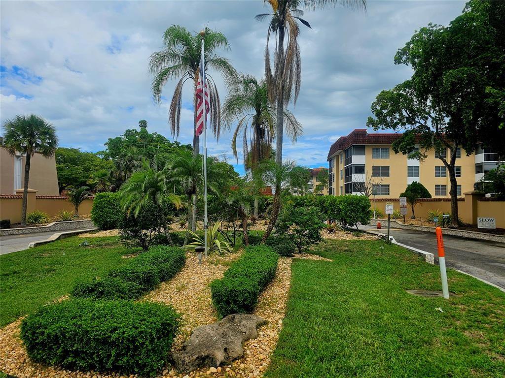 Welcome home to a spacious 2/2 unit in a gated community with secured access to building where you can enjoy life in tropics. Ideal for vacation home or primary residence . Centrally located and close to everything you could possibly need, conducive to an active lifestyle with great amenities (pool, gym, tennis, pickle ball and more). You will fall in love with a generously sized master bedroom and walk-in closet, spacious 2nd bedroom with updated bathroom, kitchen and many other desirable features. Escape the summer heat with a newly installed AC & recently painted interior or relax on your screened balcony & become one with nature. Enjoy the convenience of a stackable washer and dryer inside the unit. Move-in ready!