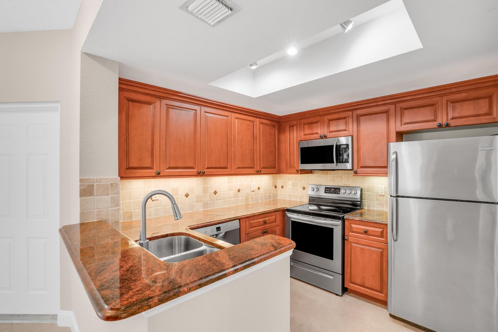Photo of 2802 Sarento Place #110, Palm Beach Gardens, FL 33410 (MLS # R11128001)