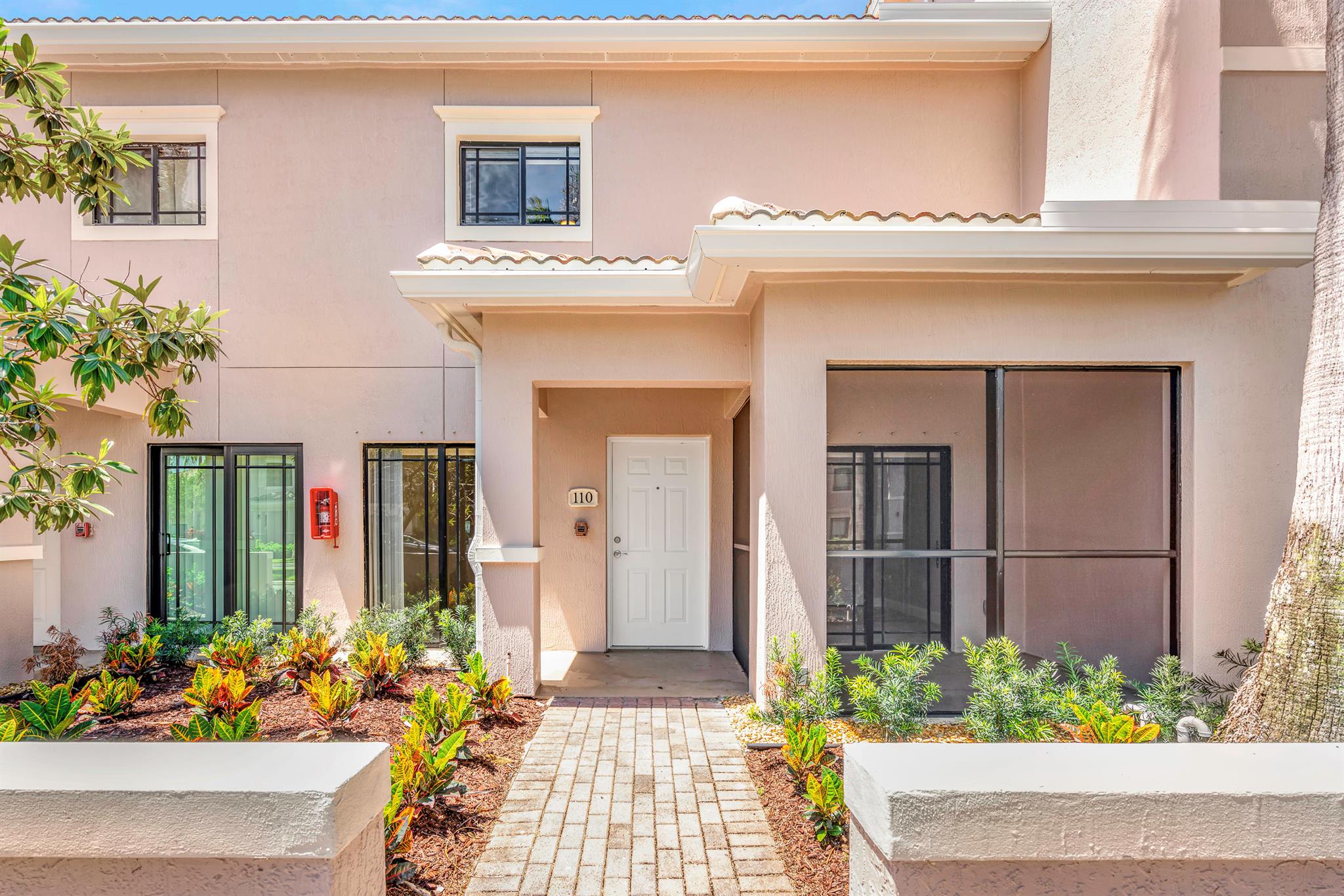 Welcome to resort-style living in the heart of Palm Beach Gardens! This beautifully updated 3-bedroom, 3-bathroom condo with 1 car garage and screened patio in the highly desirable gated community of San Matera offers the perfect blend of comfort, space, and modern convenience. Boasting a rare two-story layout with a versatile loft, this home is ideal for those who value both functionality and style. Each bedroom features its own updated en-suite bathroom, providing a private retreat for family, guests, or roommates. One bedroom and full bathroom are located on the first floor-perfect for added convenience or multigenerational living. Enjoy the open-concept floor plan where the spacious living and dining areas flow effortlessly into the upgraded kitchen, complete with granite countertops