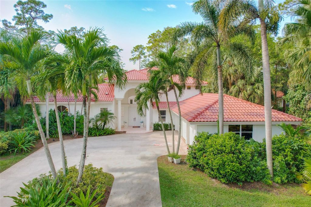 Photo of 6051 NW 65th Terrace, Parkland, FL 33067 (MLS # F10408052)