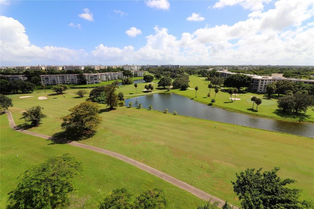Photo of 3520 Oaks Way #903, Pompano Beach, FL 33069 (MLS # F10406757)