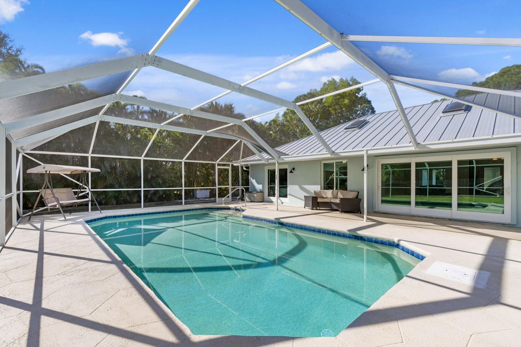 Photo of 17392 Mellen Lane, Jupiter, FL 33478 (MLS # R11153072)