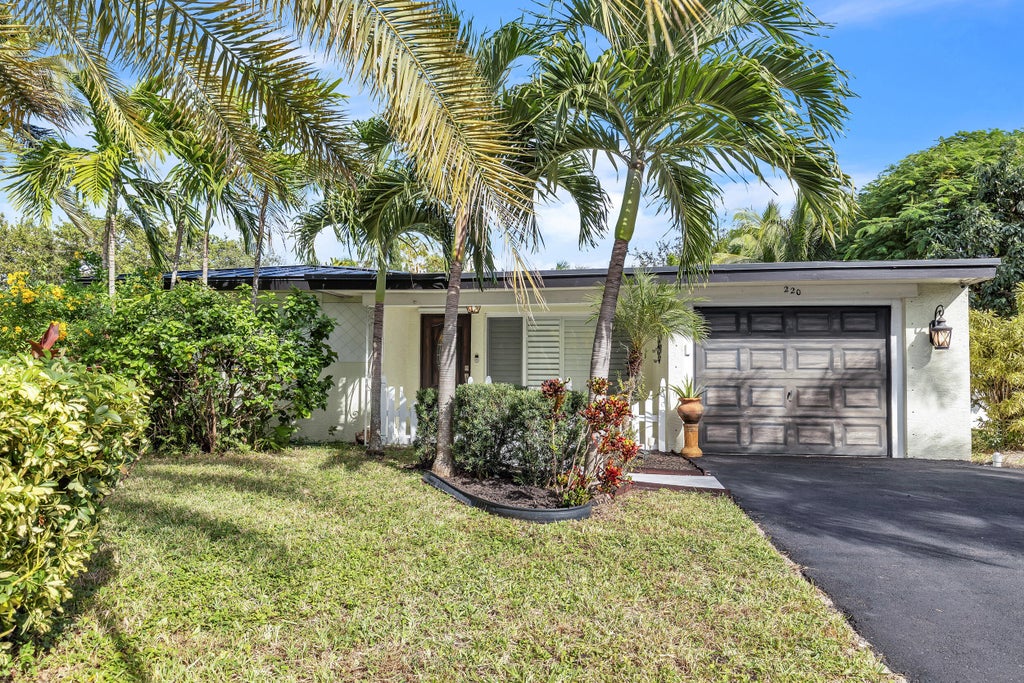 Photo of 220 NW 12TH Street, Boca Raton, FL 33432 (MLS # B26093842)