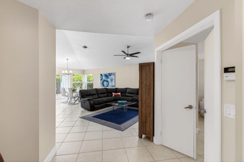 Photo of 2034 NW 52nd Street, Boca Raton, FL 33496 (MLS # B26028213)