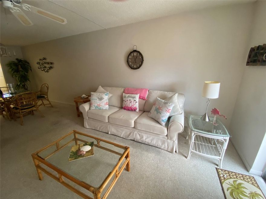 2 BEDROOM 2 FULL BATH, 55 AN OVER COMMUNITY. MINUTES TO BEACH, ENJOY THIS CONDO  WITH ENCLOSED PATIO FROM LIVING ROOM OVERLOOKING THE POOL, AND GARDEN AREA. UNIT HAS CARPET AND VINYL FLOORING. NICELY FURNISHED IT IS "MOVE IN READY". WALK IN CLOSET, IN MASTER BATH,  GUEST BATH HAS TUB SHOWER COMBO WHILE MASTER BATH HAS WALK IN SHOWER. PULL DOWN HURRICANE SHUTTERS ON ALL WINDOW OPENINGS. BIKE STORAGE IN BUILDING WITH CAR WASH AREA FOR OWNERS. MINUTES TO DEERFIELD BEACH, PIER AREA, BEACH RESTAURANTS AND SHOPPING. NON RENTAL BLDG.