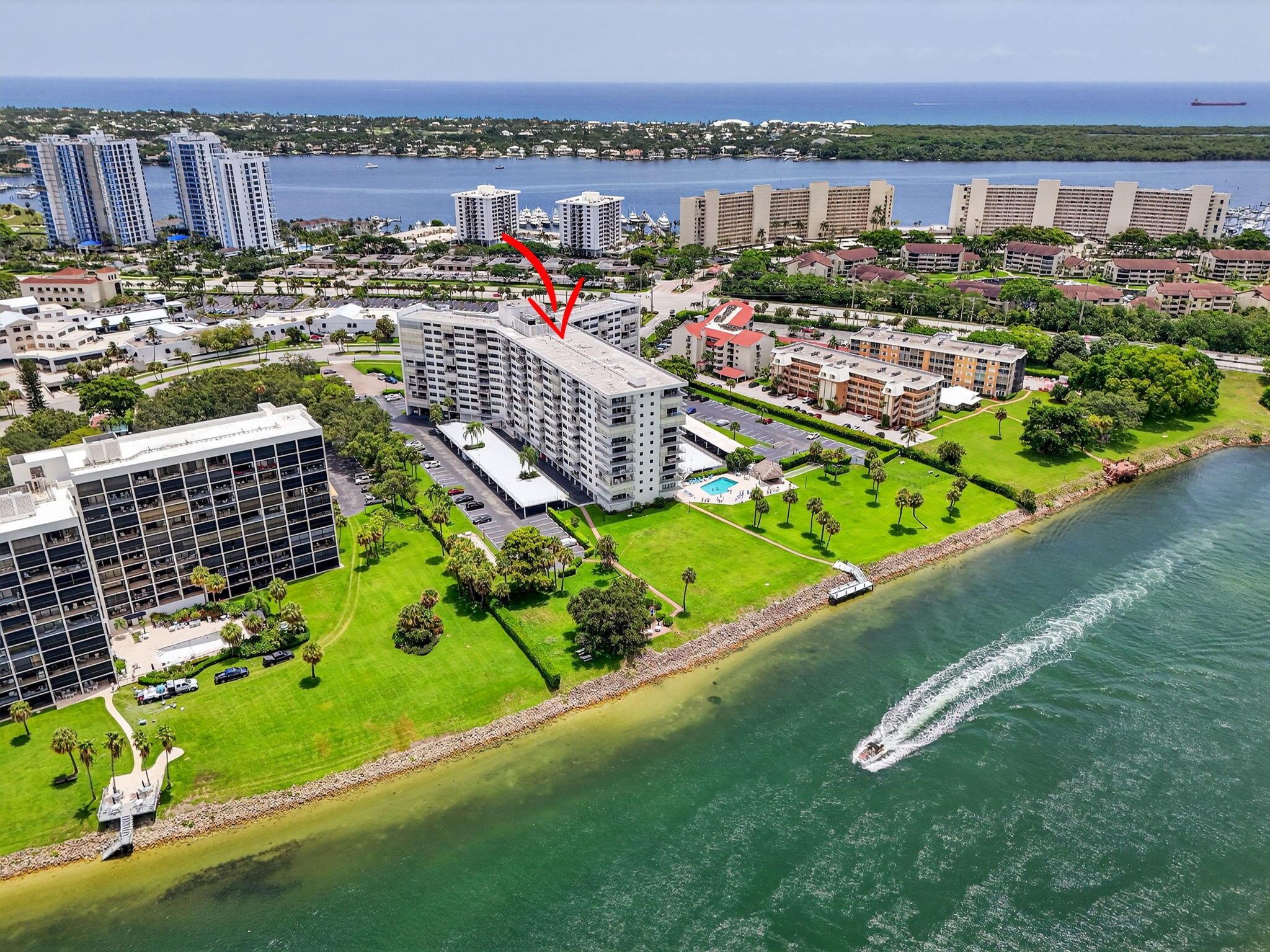 Very well modern updated 10th floor unit with gorgeous views of the intracoastal waterway, and N. Palm Beach Country Club golf course. Offered fully furnished turnkey. Enjoy sunsets, city lights and more! New impact windows and sliders. New updated kitchen and baths, Milestone inspection completed. Covered parking space. Balcony maintenance completed. Community offers heated swimming pool, tiki hut, day dock on intracoastal with kayak launch, BBQ area by the water, park-like grounds, bike storage room, billiard room, library, fitness room. Great clubhouse You must take a look.