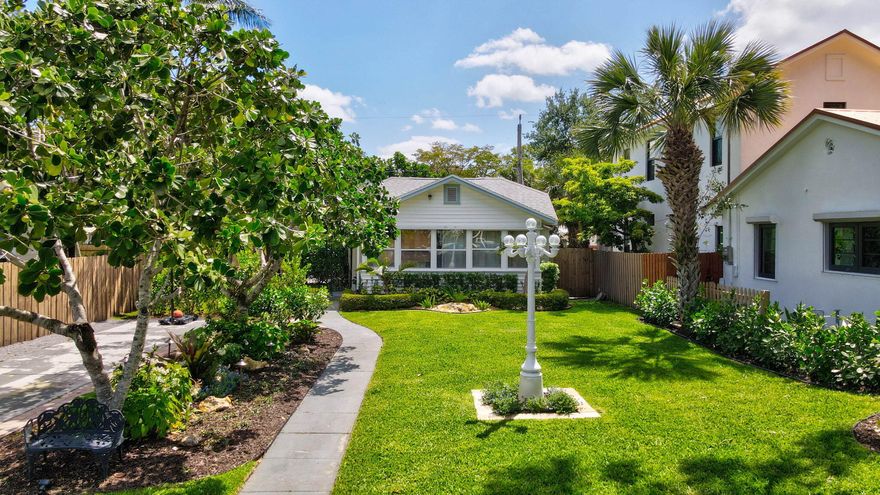 This home has been so much more than just a place to live for me, it's been a space filled with memories, character, and so much heart.  Originally built in 1925, I fell in love with the charm the moment I walked in. The original Dade County pine floors, the exposed beams, the vaulted ceilings... it just feels different in the best way. I've put a lot of care into preserving that history while thoughtfully updating the home to make it comfortable and functional for everyday life.  The kitchen became one of my favorite spaces, with custom cherry wood cabinetry, a hardwood countertop, induction cooktop, and double drawer dishwasher, it's where so many slow mornings and dinners with friends happened.   The primary suite feels like a true retreat to me. Walking through the 18th-century French doors into a space that's quiet and calming, with the marble bathroom and custom closet, has always felt a little special.  One of the things I've loved most about this property is how it's set back, giving you this big, open front yard, while still having a completely private backyard. At night, the custom landscape lighting in the front yard completely transforms the space, it softly lights everything up and can even change colors, which has made holidays, gatherings, or even just coming home at night feel a little more magical. The gazebo, the new landscaping, the turf, it's been such an easy space to enjoy, whether it's a quiet night or having people over.  Over the years, I've also made updates like replacing the roof in 2021, landscaping lighting adding a new water heater, installing security cameras, and even a Bluetooth shower speaker, little things that just make daily life better.  This home has truly been a special place for me, and I hope the next owner feels that same warmth the second they walk in.  Furniture is negotiable if someone falls in love with it the way I did.