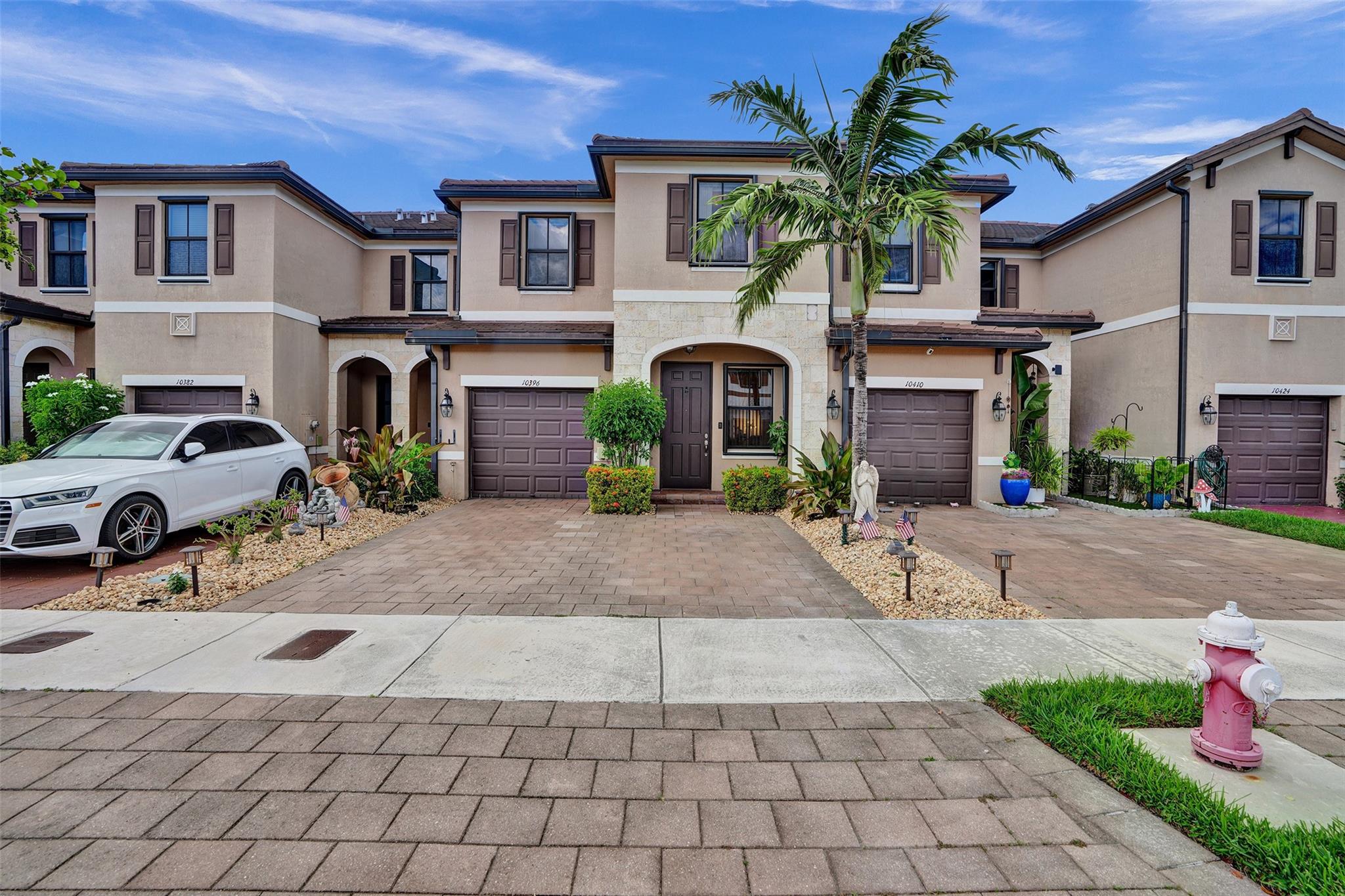 Absolutely stunning modern townhouse nested in the luxury gated AQUABELLA community! This 2018 Lennar built home offers 1959sqft of living area with 3 bedrooms and 3 bathrooms plus a good size family room which can be used as 4th bedroom to accommodate big family. The house features all tiles flooring downstairs and carpeting upstairs, granite countertop for spaces kitchen with Stainless-steel appliances. Master Bedroom has tray ceiling. 1-car garage with epoxy floor, tankless water heater. Private paved patio opens back to park/green area of parking lots. House is only 5" walk to waterfront resort style Clubhouse with business/fitness center, sparkling pools, splash park. Easy access to I75, turnpike & Okeechobee highways and shopping district. HOA $142.53/month. **EASY TO SHOW AND SELL**