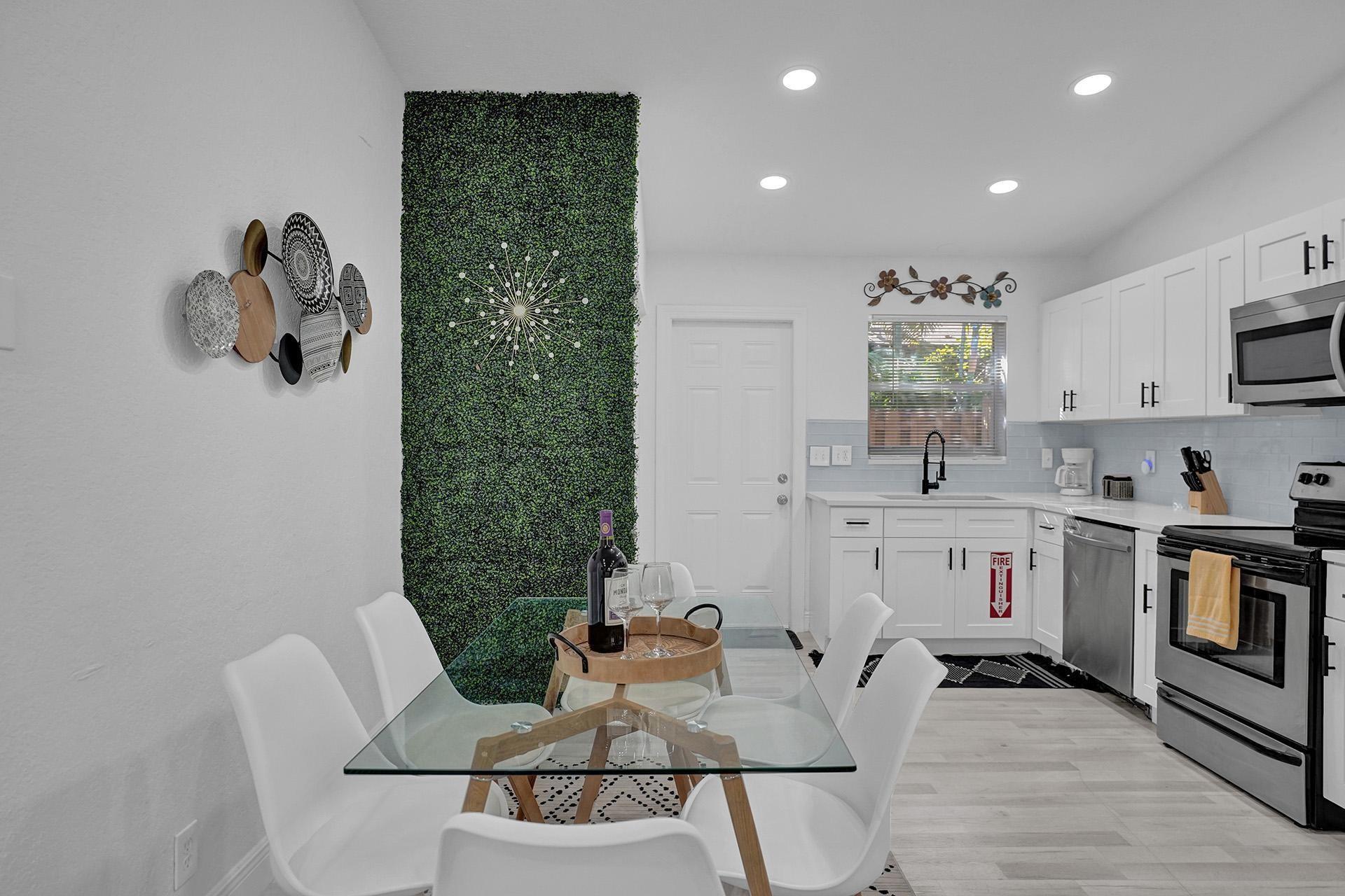 Location! Location! Location! Only 1 mile to Wilton Manors Drive, 2 miles to Downtown Ft. Laud. and 5 miles to Ft. Laud. Beach, close to all major highways! Live in one side and have the other rented with income! Each unit comes with 2 beds & 2 baths. The updated features include New Shingle Roof 2023, New Impact Windows & Doors, sleek LVP flooring all throughout, renovated kitchens with quartz countertops, shaker cabinets & stainless-steel appliances, recessed lighting, & updated bathrooms for Unit 1. Each Unit comes with a washer/dryer in the unit, 2 dedicated parking spots and a private backyard seating/patio area. This property sits on a corner lot where the side street is a one-way street.