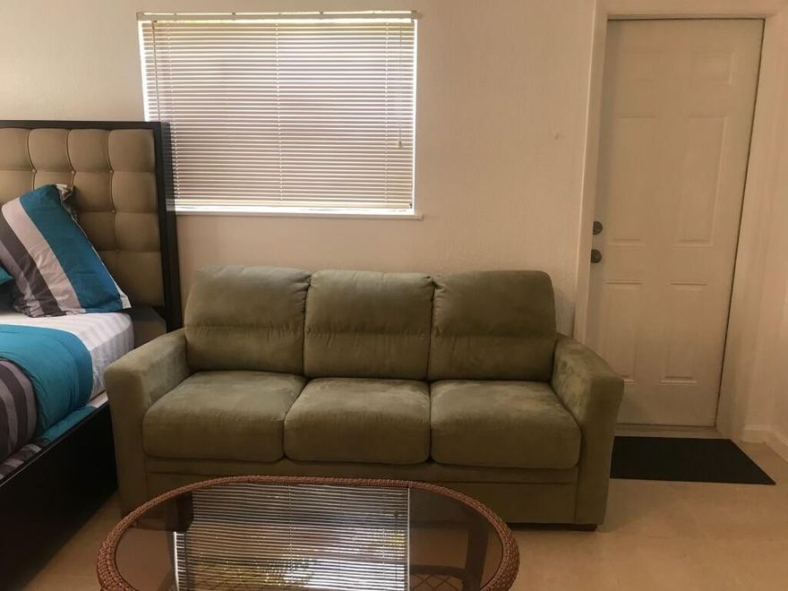 This property is a single-family residence comprising three separate rental units, each with its own private exterior entrance. This particular unit features a Refrigerator and microwave. Full bathroom and is partially furnished with a queen-size bed. All utilities are included, as well as one designated parking space. We seek a responsible adult applicant with good credit and a clean background. Great location near plent of shopping, restuarants and beaches.