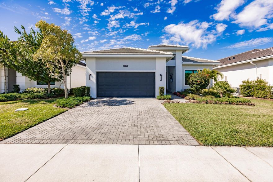 * MOTIVATED SELLER* 

Located within the 55+ community of Cresswind Palm Beach, this pristine Fiesta Model is set on a large, fully fenced homesite and offers a thoughtful blend of upgrades, comfort, and low-maintenance living. The home features 3 bedrooms, 3 full bathrooms, and a separate den, all within an open layout enhanced by high ceilings and tile flooring throughout.

The kitchen is designed for both everyday use and entertaining, featuring two-tone soft-close cabinetry, an expansive quartz work surface, stainless steel appliances, and quartz countertops throughout the home. The open living and dining areas flow seamlessly, creating a bright and inviting space.
The primary suite offers a generously sized walk-in shower with zero-entry access, and beautifully upgraded finishes. Guest bedrooms are well proportioned and paired with full baths, providing flexibility for visitors or additional living space.

Notable upgrades include impact windows and doors, a tankless water heater, epoxy-finished garage flooring, and a 220V electric vehicle charging outlet.

Enjoy the covered lanai overlooking a private backyard with ample room to add a future pool or outdoor living area.

Residents enjoy HOA-included high-speed internet, full lawn care, and access to two exceptional amenity centers. The community clubhouse, led by a full-time lifestyle director, features a SmartFIT Training Center powered by EGYM, event and game rooms, an arts and crafts studio, pickleball and tennis courts, a dog park, resort-style and resistance pools, a spa, and an outdoor event plaza.
Ownership also includes access to Westlake's renowned Adventure Park, showcasing a lagoon-style pool with a three-story slide, splash pad, cabanas, outdoor concert pavilion, basketball courts, an adult-only lodge-style pool, playgrounds, dog parks, and a BMX pump park.