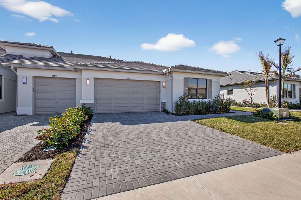 Photo of 13488 SW Starkissed Lane, Port Saint Lucie, FL 34987 (MLS # R11162646)