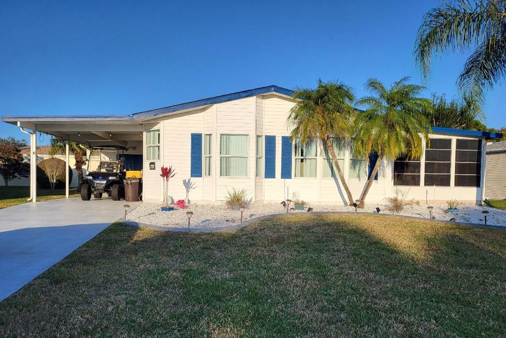 Photo of 3016 Five Iron Drive, Port Saint Lucie, FL 34952 (MLS # R11158366)