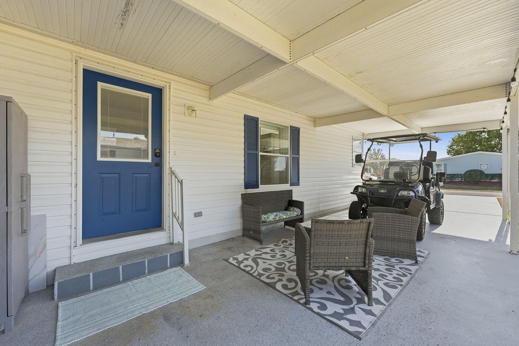 Photo of 3016 Five Iron Dr, Port Saint Lucie, FL 34952 (MLS # R11158366)