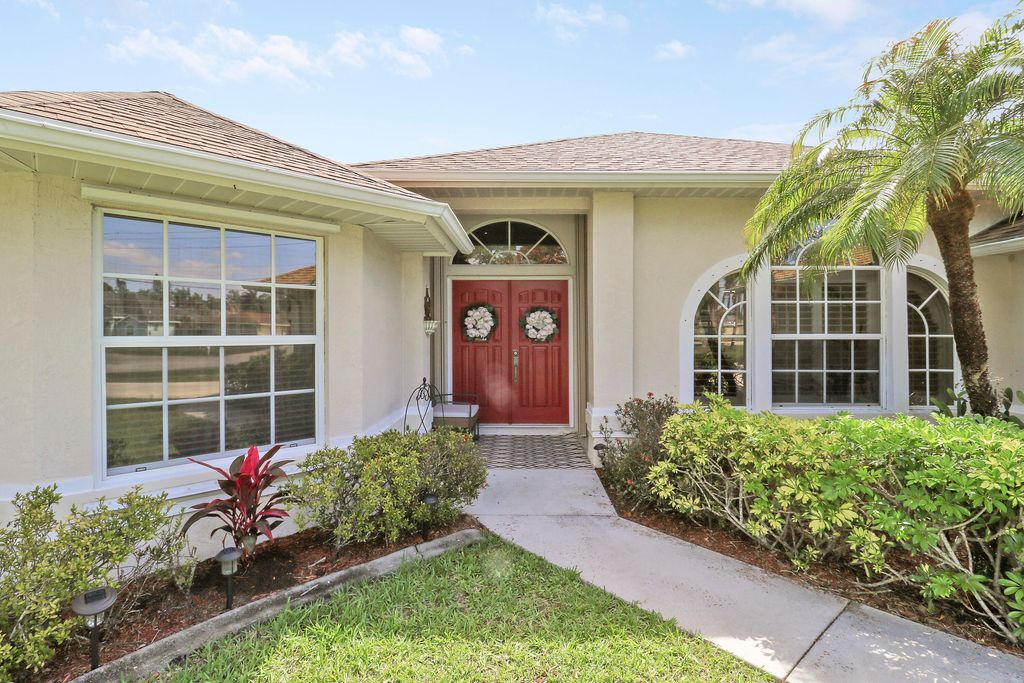 Photo of 1991 SE Manth Lane, Port Saint Lucie, FL 34983 (MLS # B26013277)