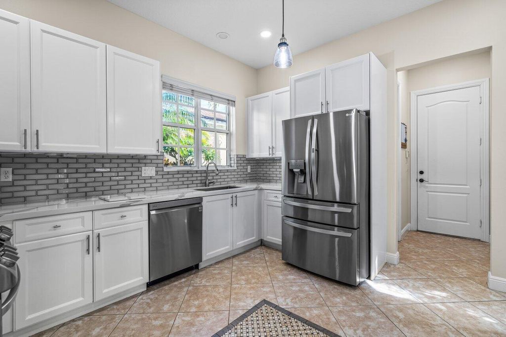 Photo of 137 Sugarberry Drive, Jupiter, FL 33458 (MLS # R10999503)